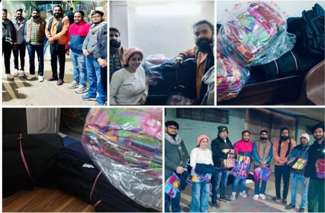 MVSS volunteers distributing blankets to underprivileged individuals during winter on 4 January 2025